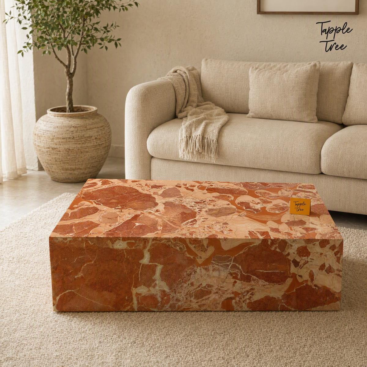 Imported stone coffee table — lifestyle front; glossy terracotta and cream finish