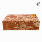 Imported stone coffee table — white front; glossy terracotta and cream finish