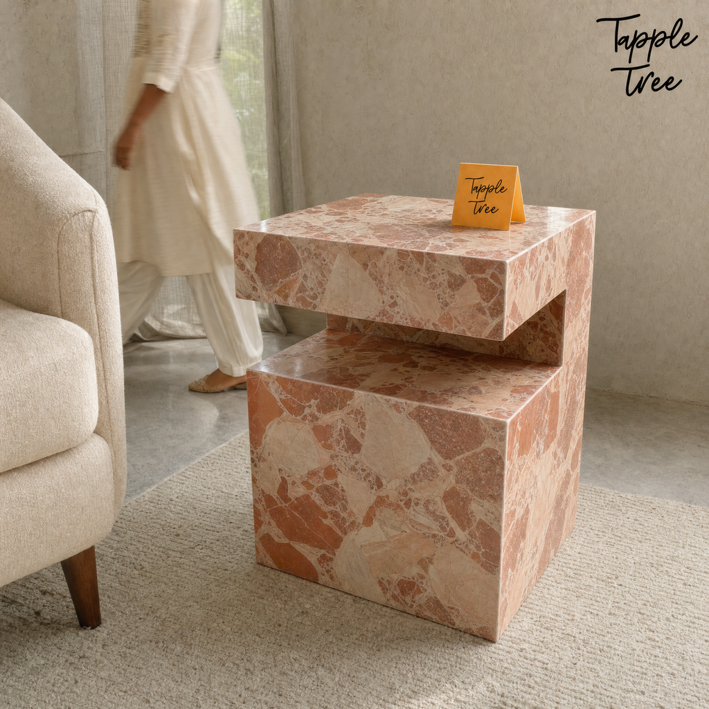 Imported stone side table — lifestyle walking woman; glossy terracotta and cream finish