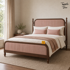 Rust Stripe Teak Upholstered Bed, lifestyle view with a removable Tapple Tree tag resting on the bed and a small corner logo