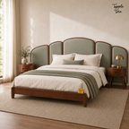 Arc Panel Teak Bed with Nightstands, lifestyle view with a removable Tapple Tree tag resting on the bed and a small corner logo