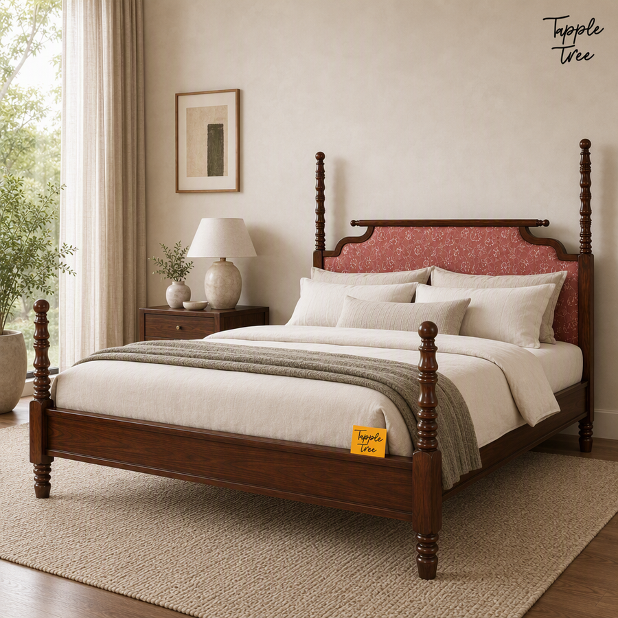 Coral Tapestry Teak Poster Bed, lifestyle view with a removable Tapple Tree tag resting on the bed and a small corner logo