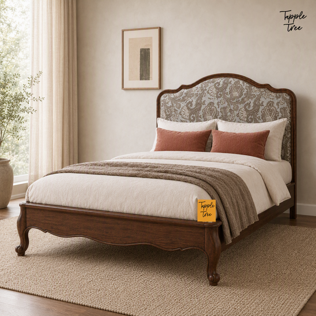 Paisley Curve Teak Bed, lifestyle view with a removable Tapple Tree tag resting on the bed and a small corner logo