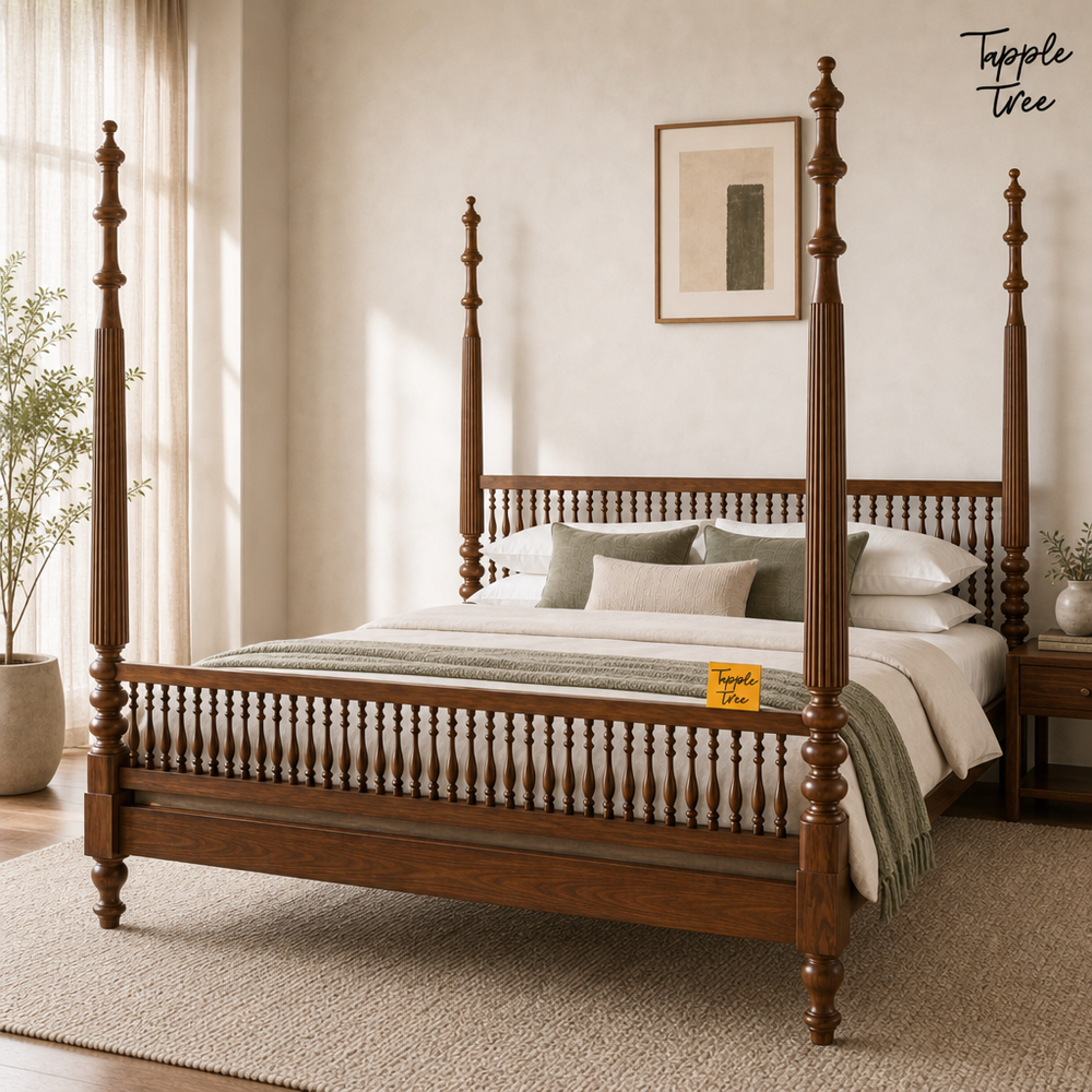 Heritage Spindle Teak Four Poster Bed, lifestyle view with a removable Tapple Tree tag resting on the bed and a small corner logo