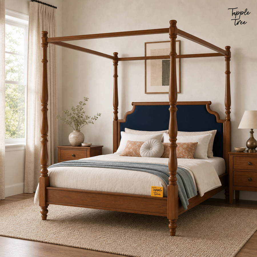Midnight Blue Teak Canopy Bed, lifestyle view with a removable Tapple Tree tag resting on the bed and a small corner logo