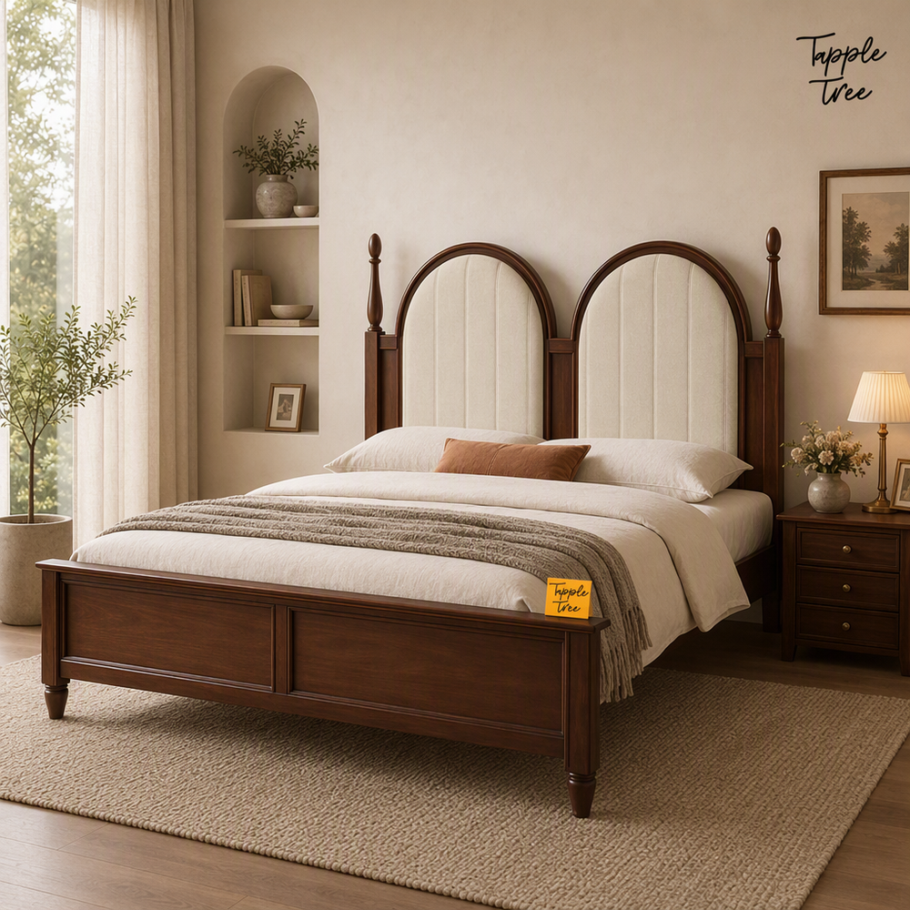 Twin Arch Teak Upholstered Bed, lifestyle view with a removable Tapple Tree tag resting on the bed and a small corner logo