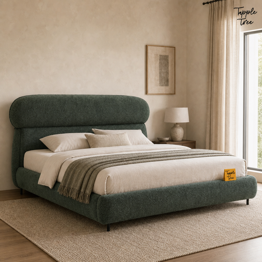 Forest Boucle Upholstered Storage Bed, lifestyle view with a removable Tapple Tree tag resting on the bed and a small corner logo
