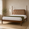 Botanical teak upholstered bed with turned posts in a warm ivory bedroom, front three-quarter view