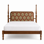 Botanical upholstered teak bed, front view on a white background