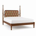 Botanical upholstered teak bed, opposite three-quarter view on a white background