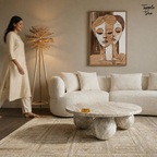Beige Orb Marble Coffee Table — lifestyle walking woman