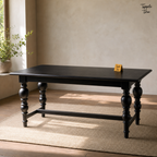 Noir Trestle Mango Dining Table — lifestyle opposite angle
