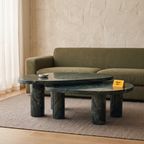 Emerald Oval Green Marble Coffee Table Set of 2, front view in a living room