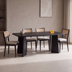 Noir Tapered Black Mango Wood 6-Seater Dining Table in an Obsidian Luxe finish, styled in a dining room