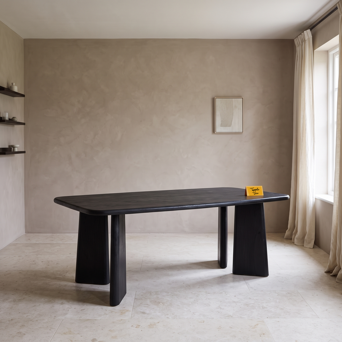 Noir Tapered Black Mango Wood 6-Seater Dining Table, three-quarter view in a dining room