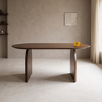 Arch Oval Acacia Wood 6-Seater Dining Table, front view in a dining room